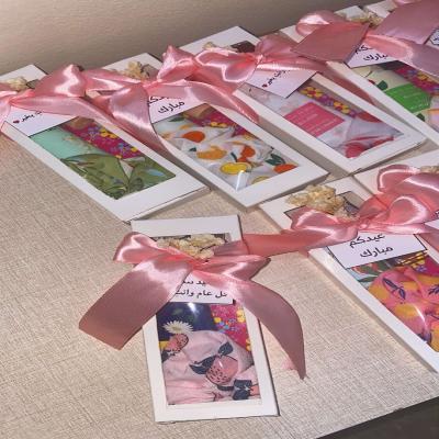 توزيعات علبه مع شريطة